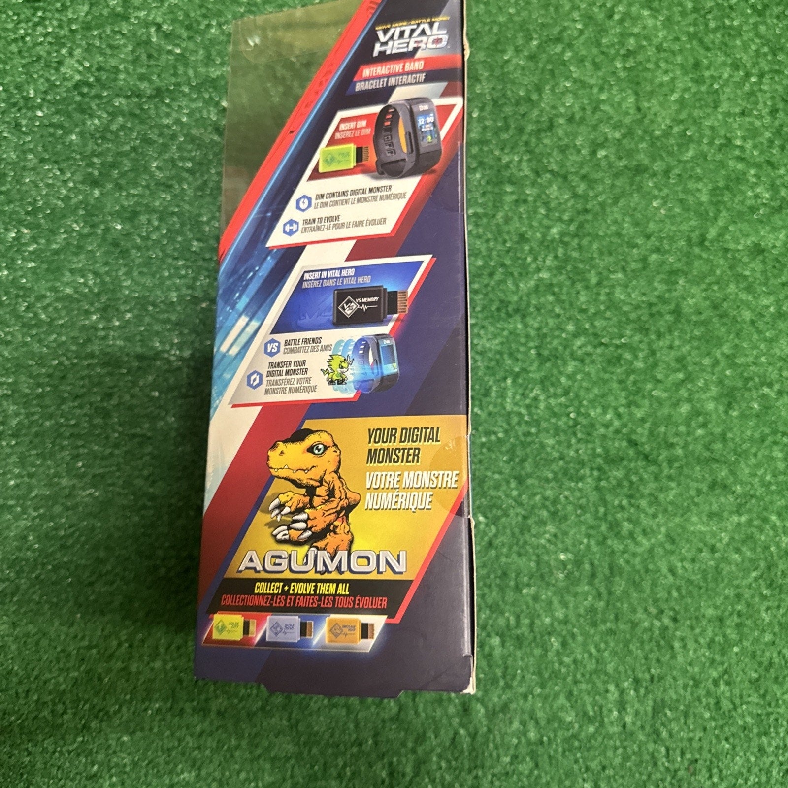 Bandai Vital Hero Digimon Red bracelet packaging featuring Agumon character and interactive digital monster details