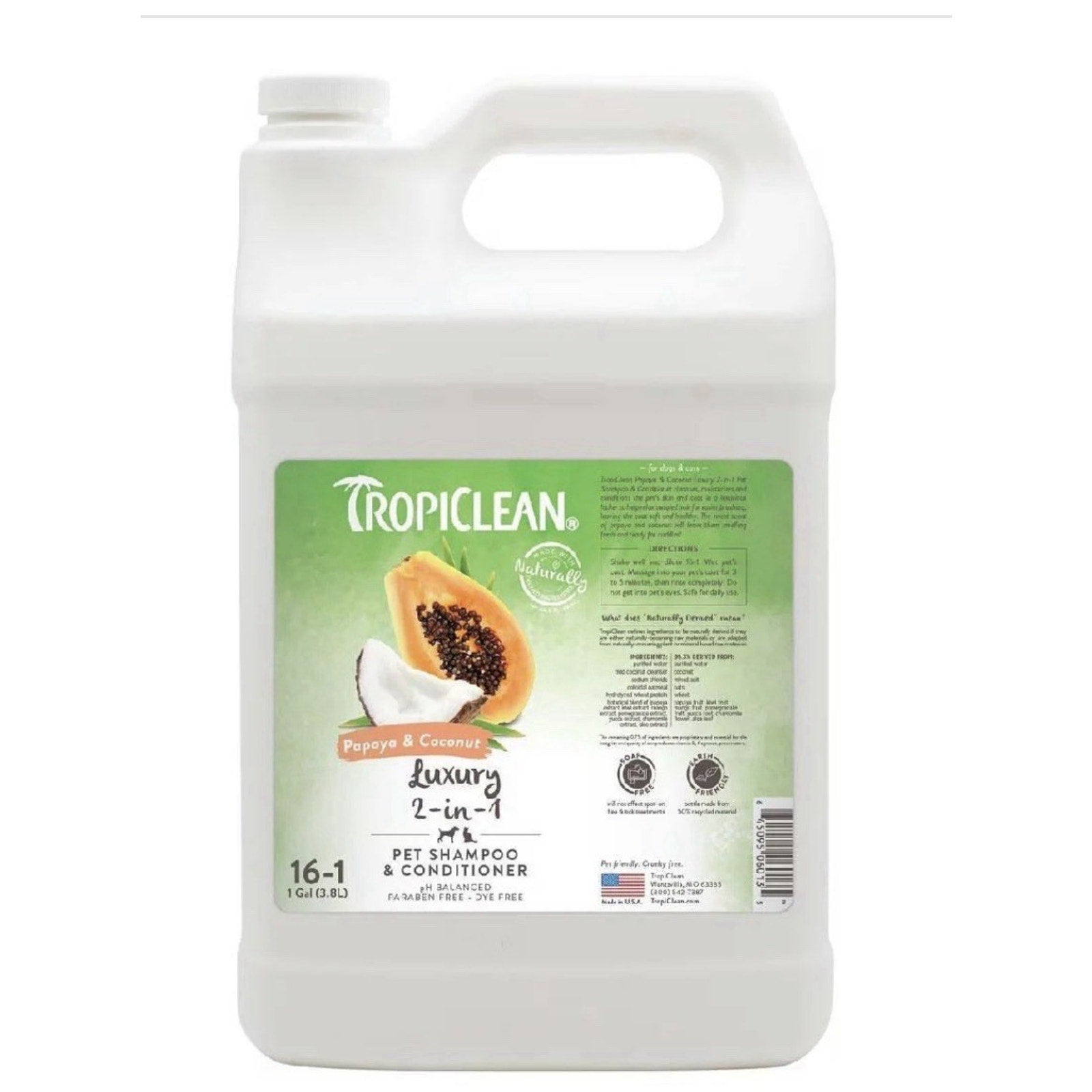 White plastic gallon jug of TropiClean pet shampoo and conditioner with a green label featuring images of papaya and coconut, product details, and branding text on a plain background.