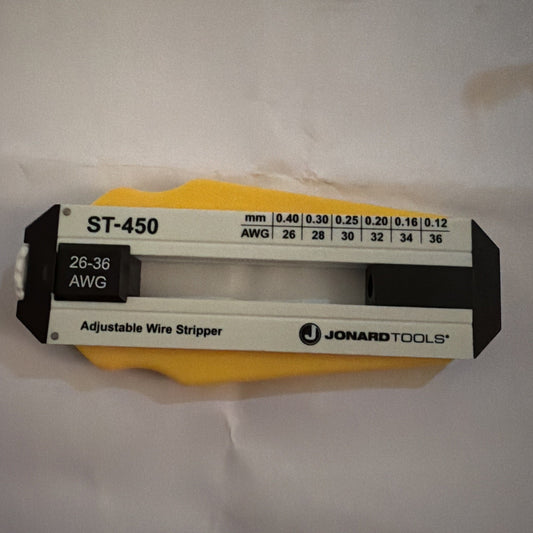 Jonard Tools ST-450 Adjustable Wire Stripper showing AWG size range and measurement markings on yellow handle