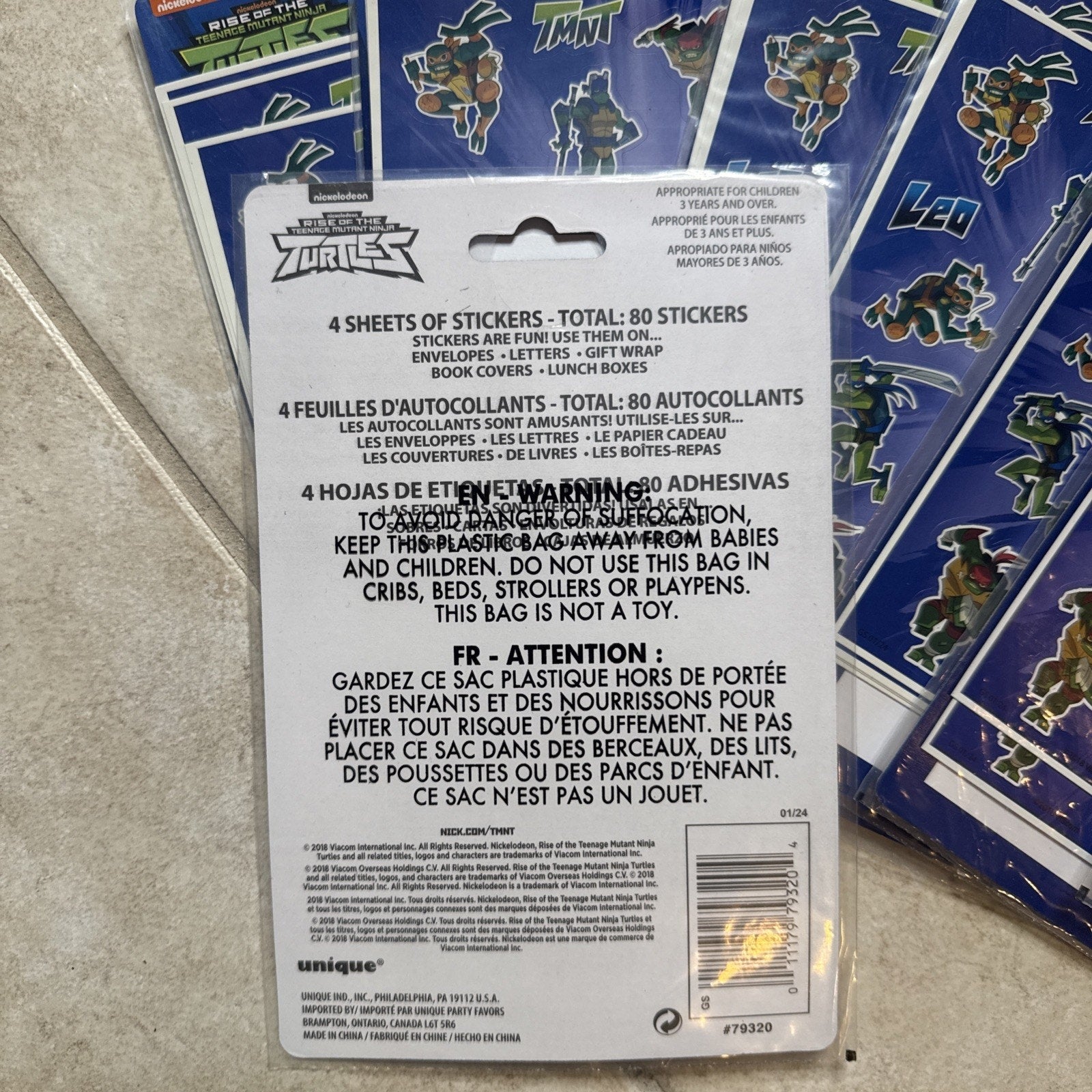 Teenage Mutant Ninja Turtles party favor set with toys, bags, and four sheets of TMNT stickers totaling 80 pieces