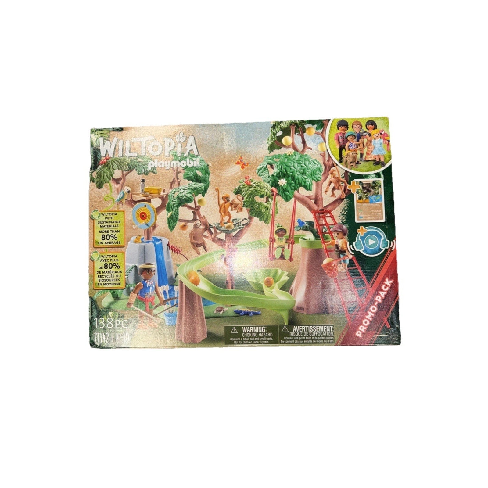 Playmobil Wiltopia themed playset box featuring treehouse structures, figures climbing ladders and playing, with nature and adventure elements visible on the packaging.