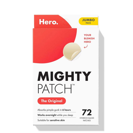 White and red rectangular box of Mighty Patch hydrocolloid acne patches with a yellow label indicating "Jumbo Pack," showing one patch lifting to reveal clear adhesive beneath, and text highlighting absorption in six hours and suitability for sensitive skin.