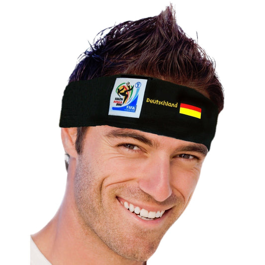 Smiling man wearing a black headband featuring the 2010 FIFA World Cup South Africa logo, the German flag, and "Deutschland" text on a white background.