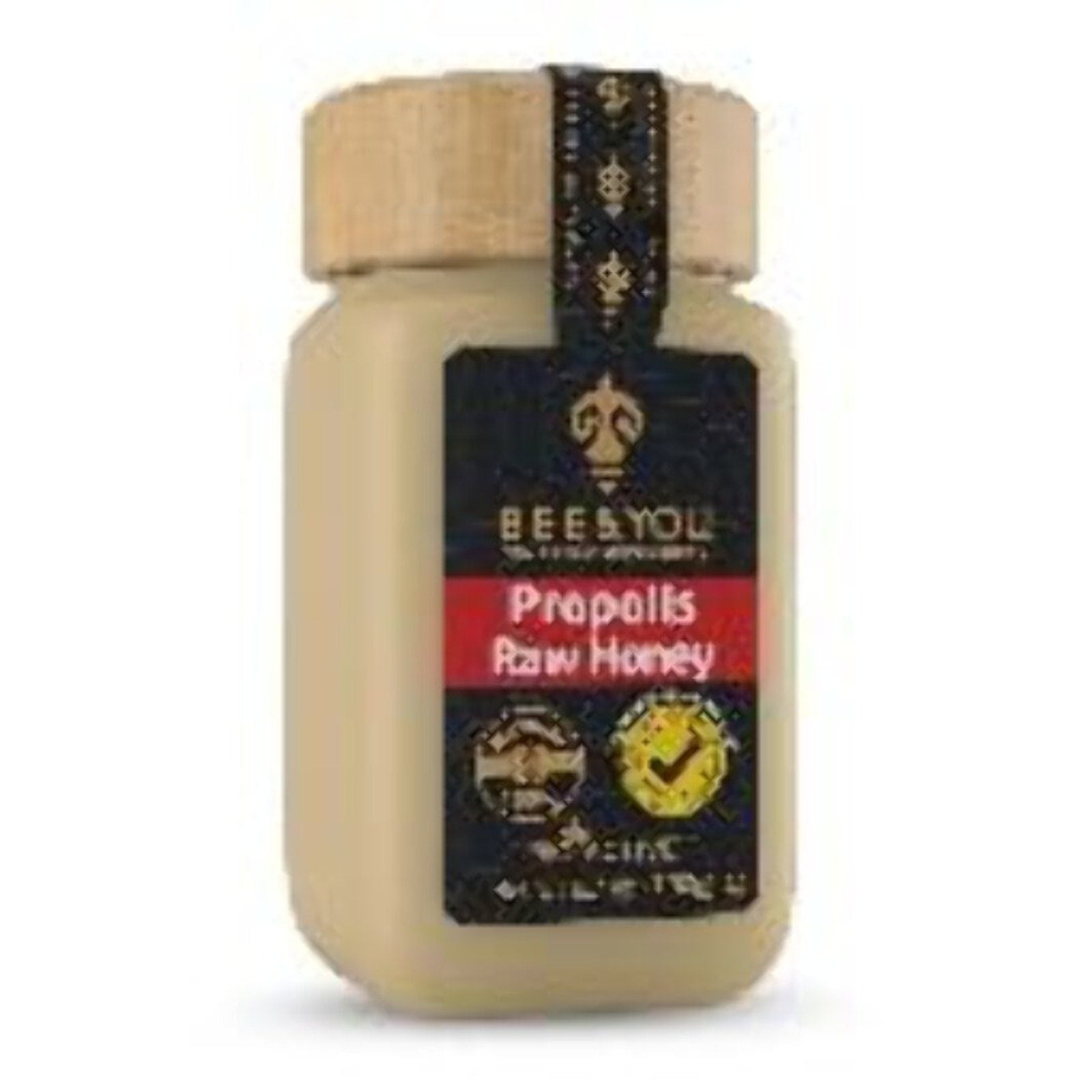 Beige rectangular jar with wooden-textured lid labeled Bee & You Propolis Raw Honey, featuring black and red label with gold accents and certification marks.