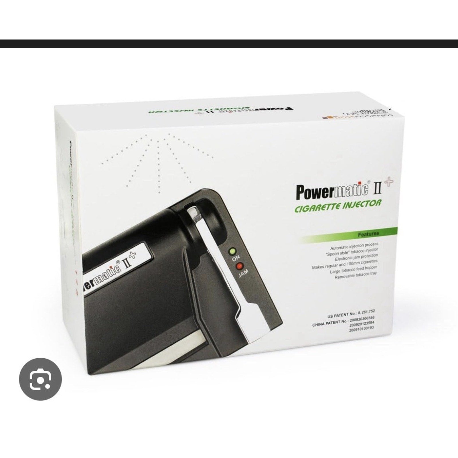 White rectangular product packaging showing a black and silver electronic device labeled "Powermatic II+" with text highlighting features like automatic precision, "spare filter" store protected, and large tobacco feed hopper.