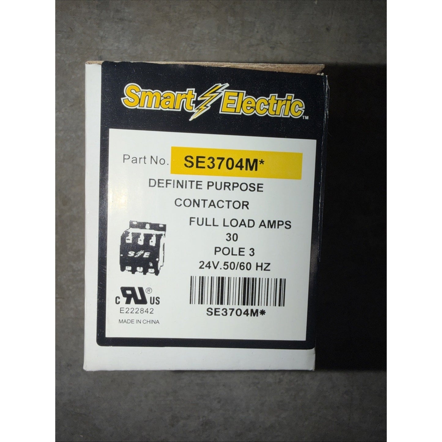 White and black box labeled with the Smart Electric logo and product details including part number SE3704M, definite purpose contactor, 30 full load amps, 3 poles, and 24V 50/60 Hz specifications.