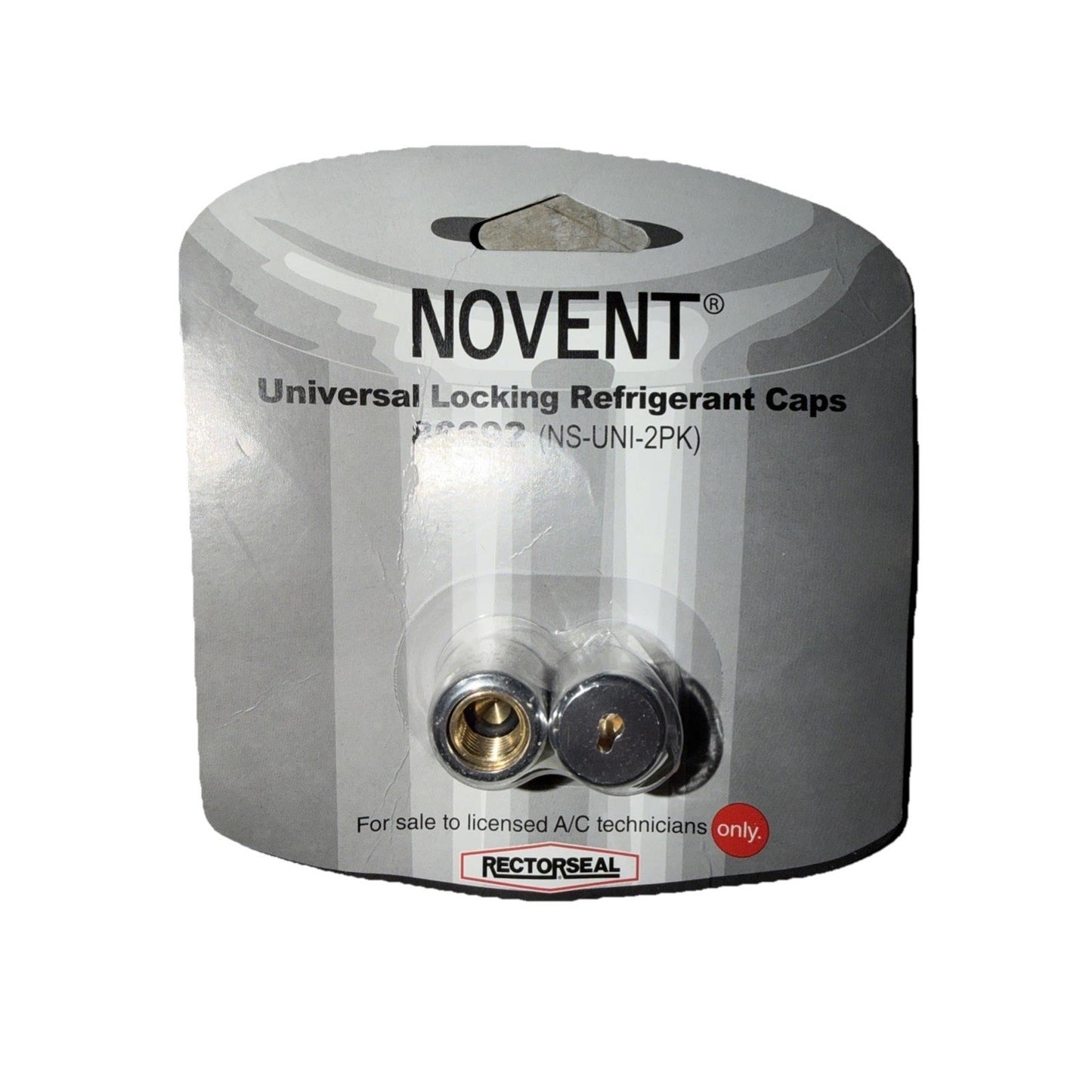 Retail packaging with two universal locking refrigerant caps in black and brass, designed for licensed air conditioning technicians, displayed against a white and gray background.