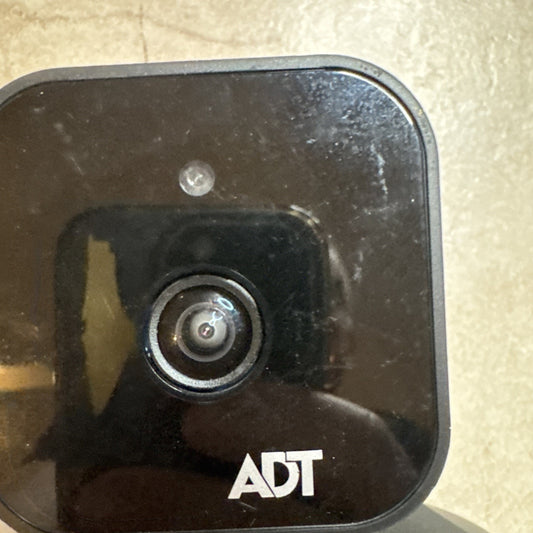ADT Wireless Network Camera 720P HD model RC8326 with black casing and visible camera lens and LED indicator light