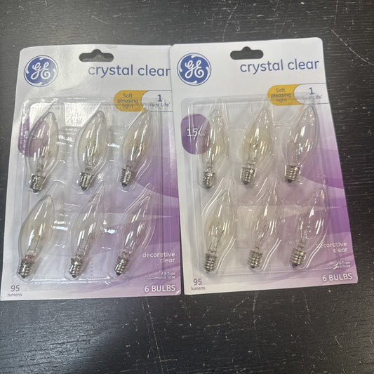 Two packs of GE crystal clear soft white 15 watt decorative light bulbs with six bulbs each in packaging