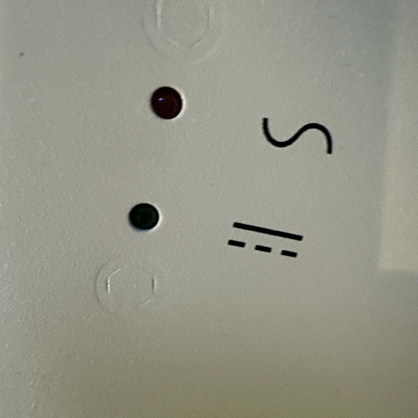 Close-up of 18 channel power supply panel showing red and green indicator lights and control markings