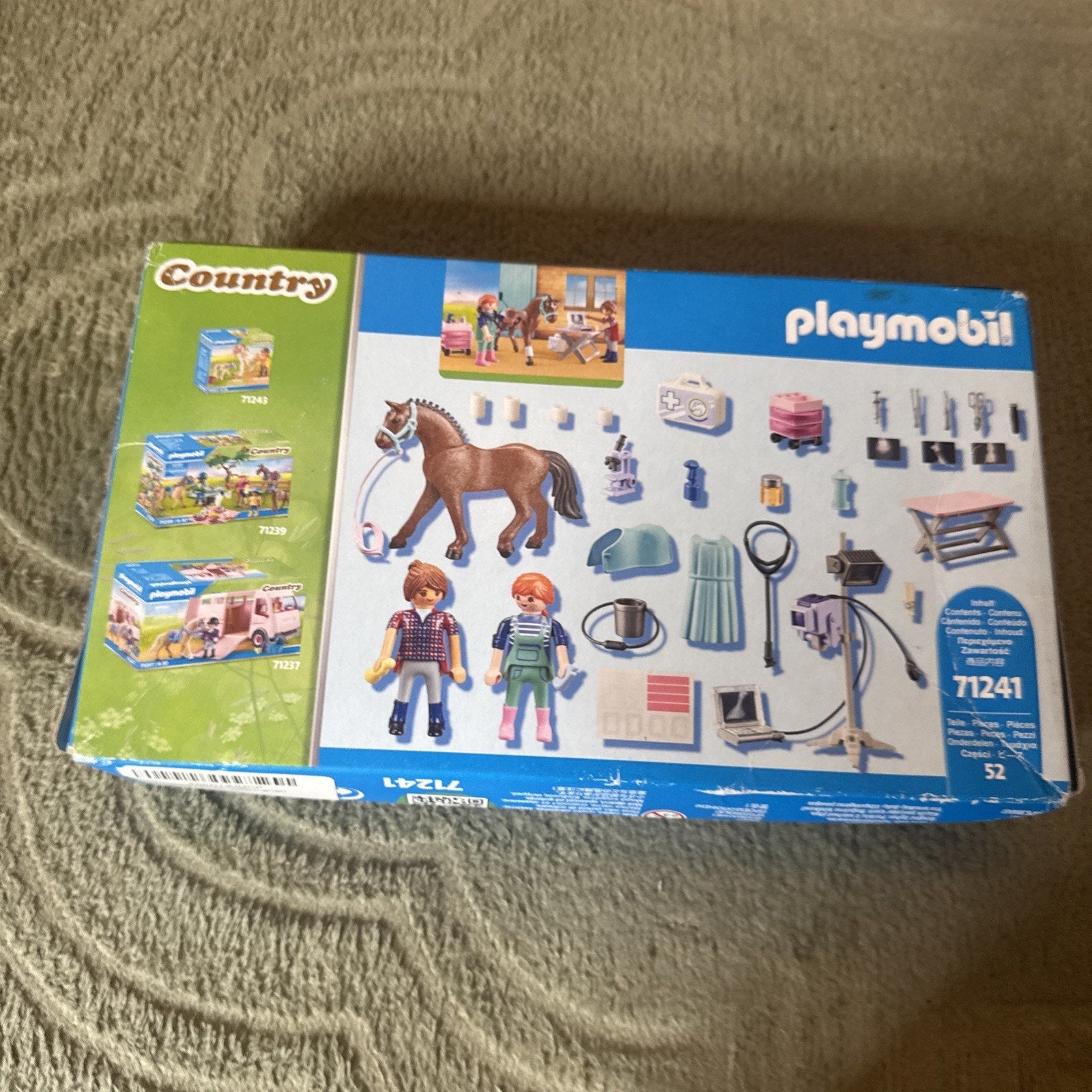 Playmobil 71241 Country Horse Veterinarian Building Set with figures, horse, and veterinary tools in packaging box