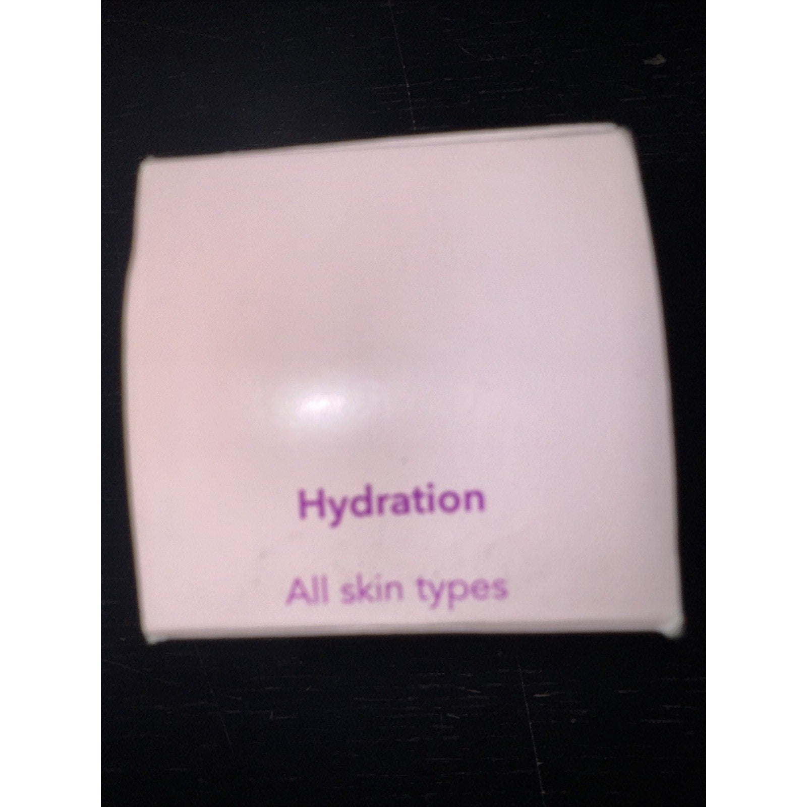 Good Molecules Hyaluronic Acid Serum box showing hydration benefits for all skin types in purple text
