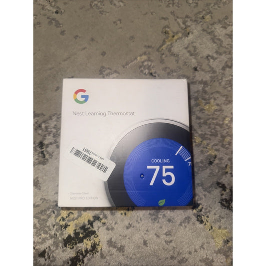 Google Nest Learning Thermostat Pro Edition T3008US in original box showing cooling set to 75 degrees