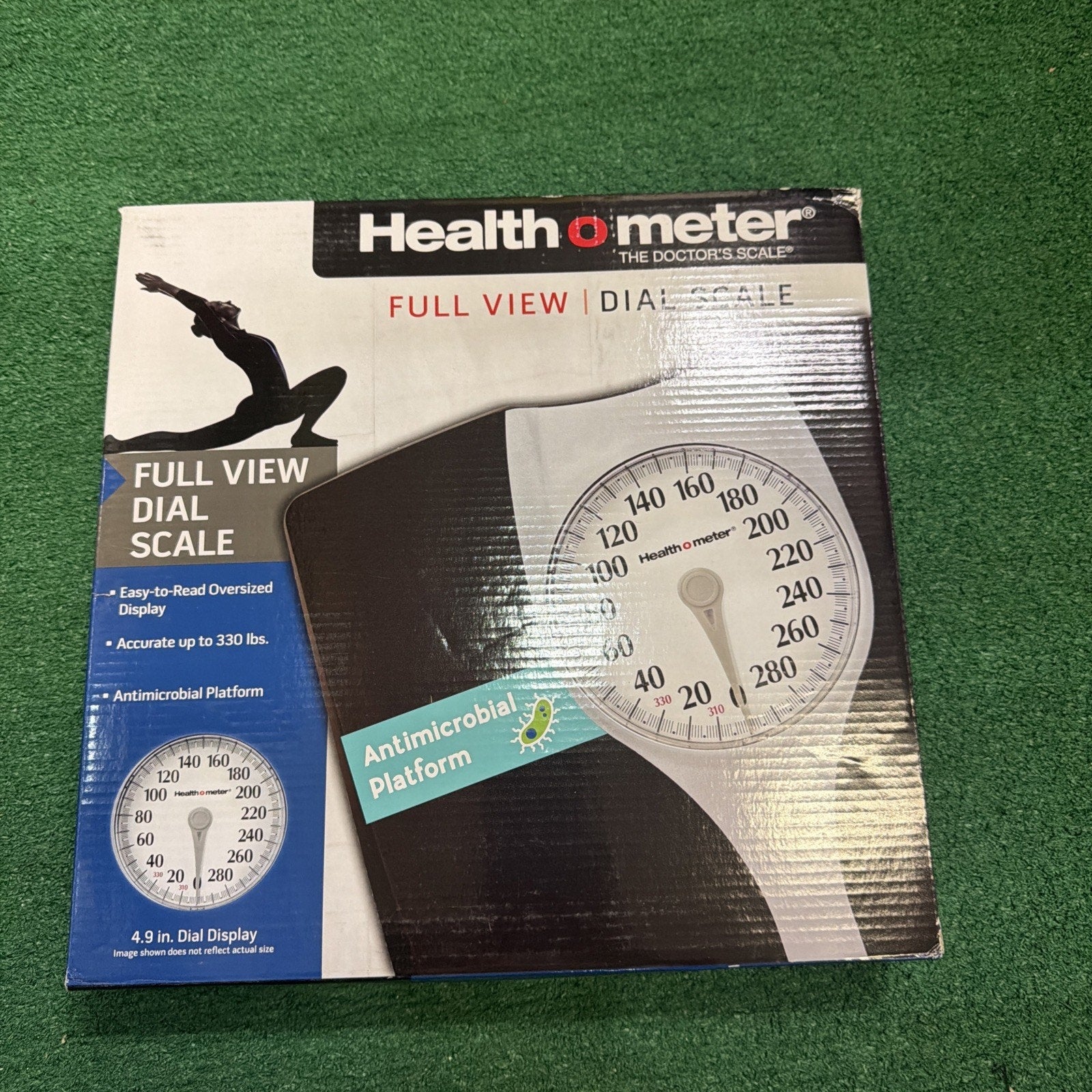 Packaging of a Health o meter full view dial scale featuring a large easy-to-read dial with antimicrobial platform, designed to measure up to 330 pounds.