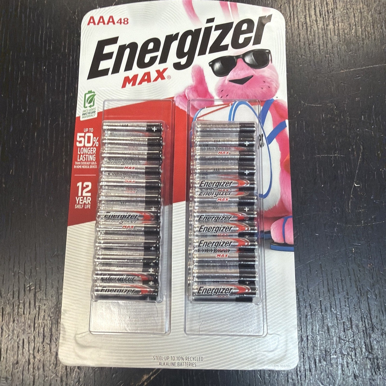 Package of 48 AAA Energizer Max alkaline batteries in two clear plastic trays on a white backing card featuring the Energizer Bunny mascot wearing sunglasses and holding a drum.