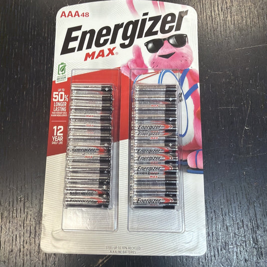 Package of 48 AAA Energizer Max alkaline batteries in two clear plastic trays on a white backing card featuring the Energizer Bunny mascot wearing sunglasses and holding a drum.