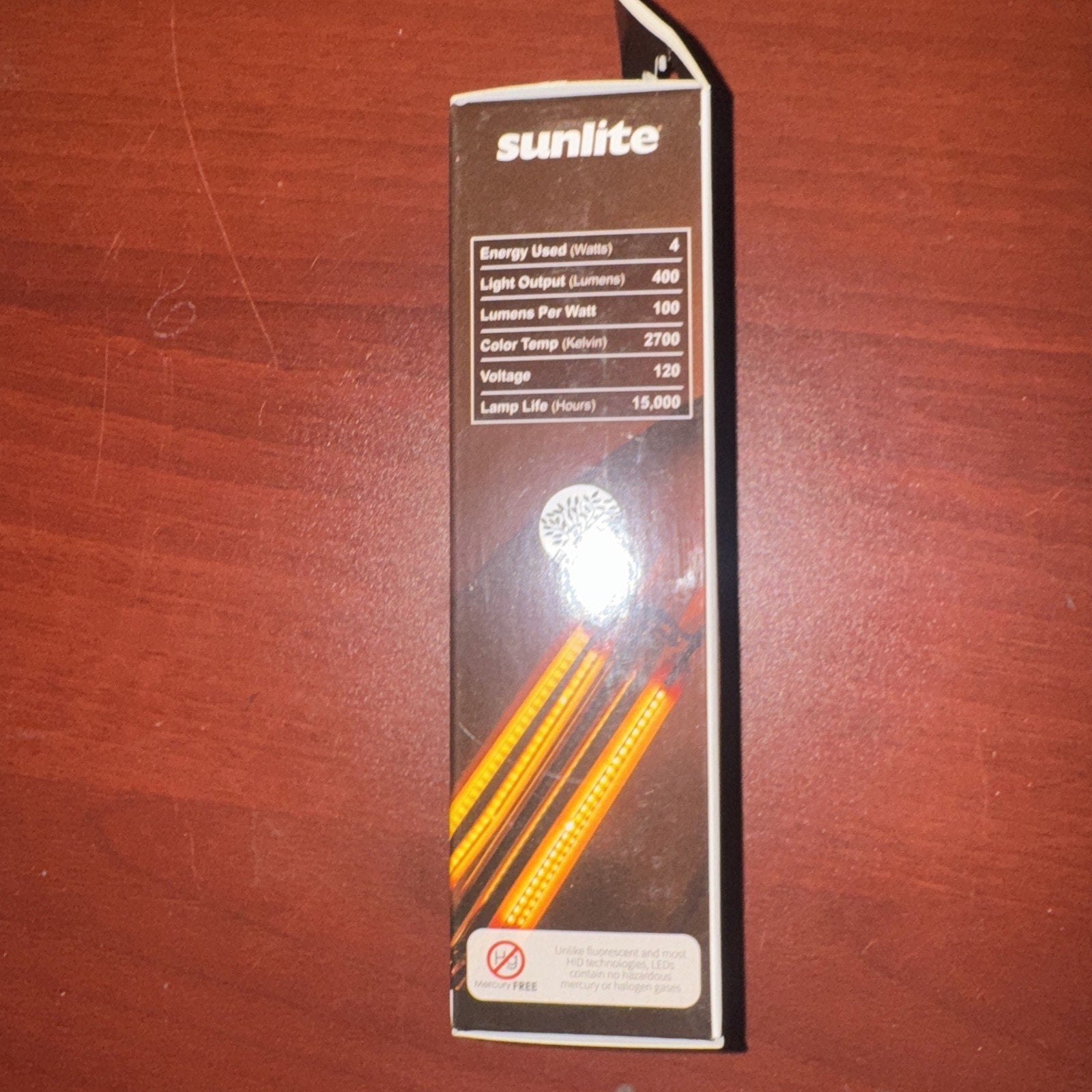 Sunlite LED Filament Chandelier Bulb 4W with clear finish and warm 2700K light on packaging box front