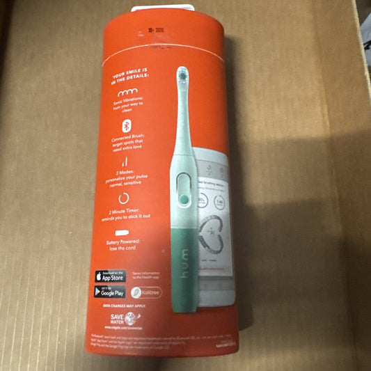 Colgate Hum smart battery powered toothbrush package showing brush and app connectivity features on orange background