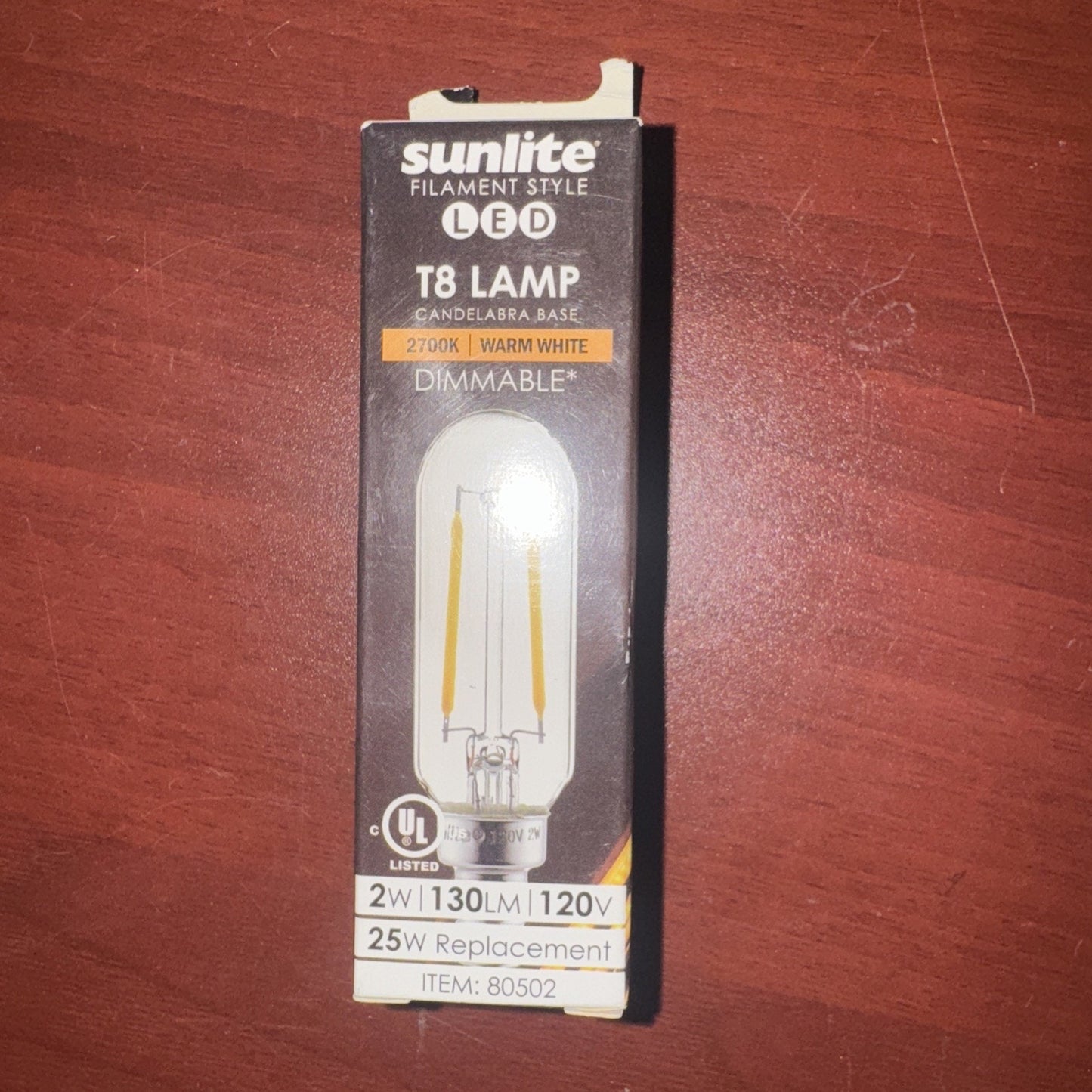 Sunlite LED T8 filament style lamp with candelabra base 2700K warm white 130 lumens dimmable bulb in packaging