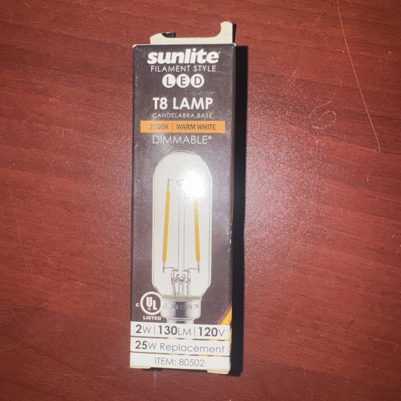Sunlite LED T8 filament style lamp with candelabra base 2700K warm white 130 lumens dimmable bulb in packaging