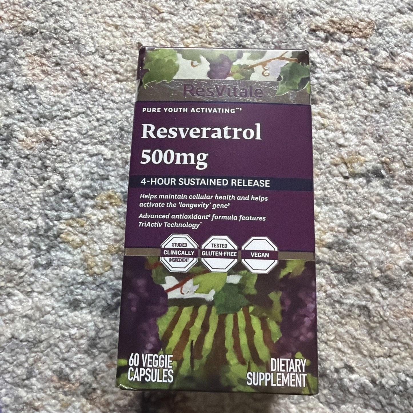 Box of ResVitale Resveratrol supplement with 500mg dosage, featuring 4-hour sustained release, claims for cellular health and longevity gene support, labeled gluten-free, vegan, and clinically studied, containing 60 veggie capsules.