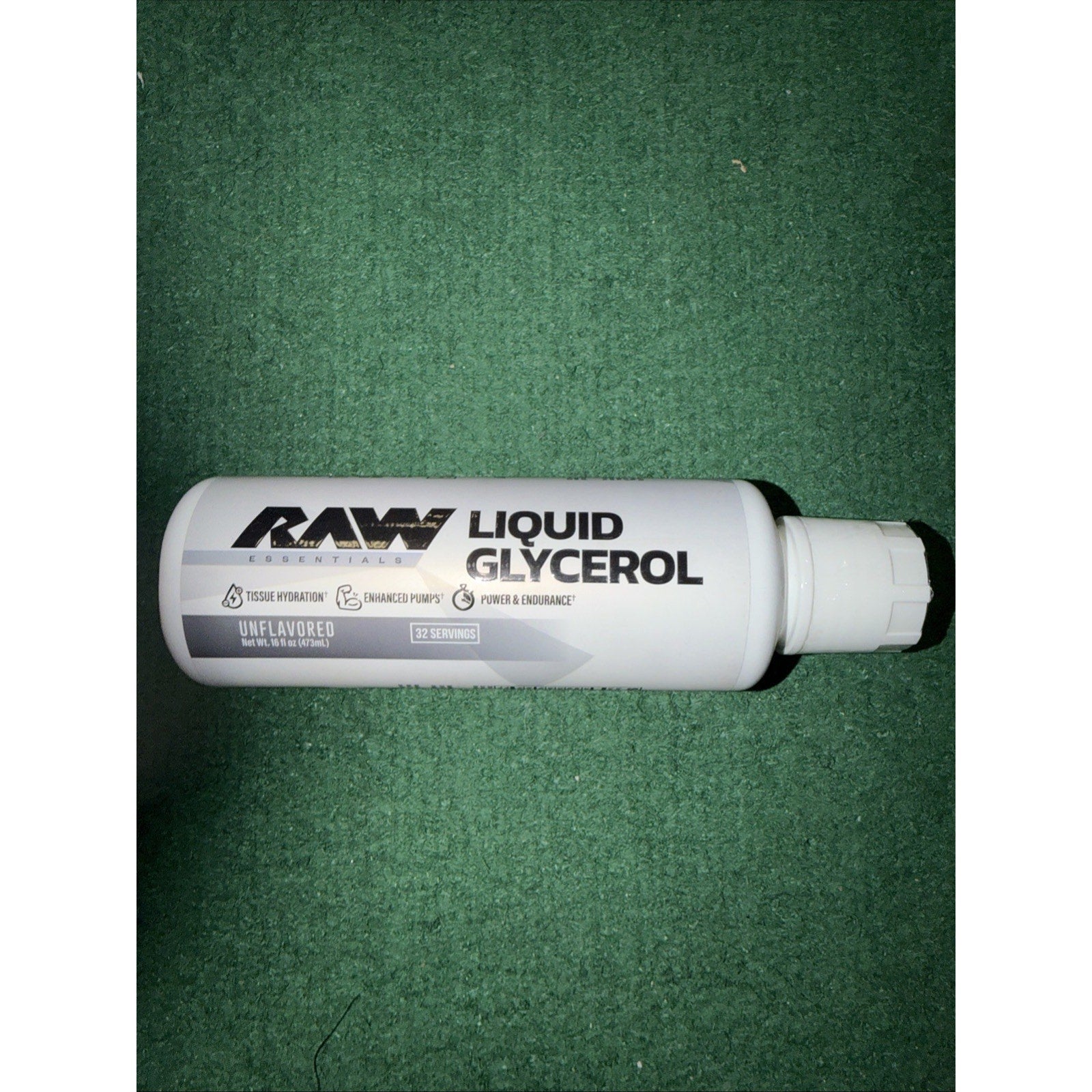 White cylindrical bottle labeled 