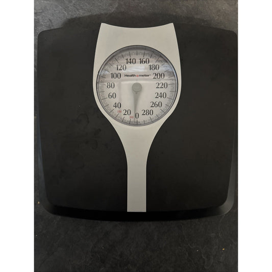 Health O Meter bathroom scale with large oversize dial and black platform showing weight measurements up to 330 pounds