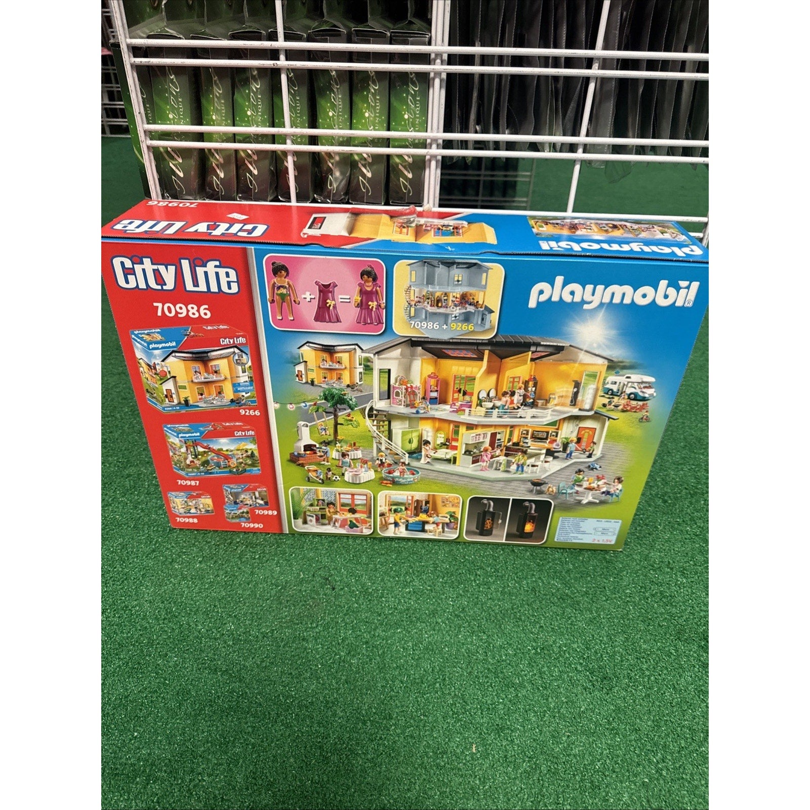 PLAYMOBIL City Life 70986 Modern Doll House Floor Extension box showing expanded dollhouse with furniture and figures