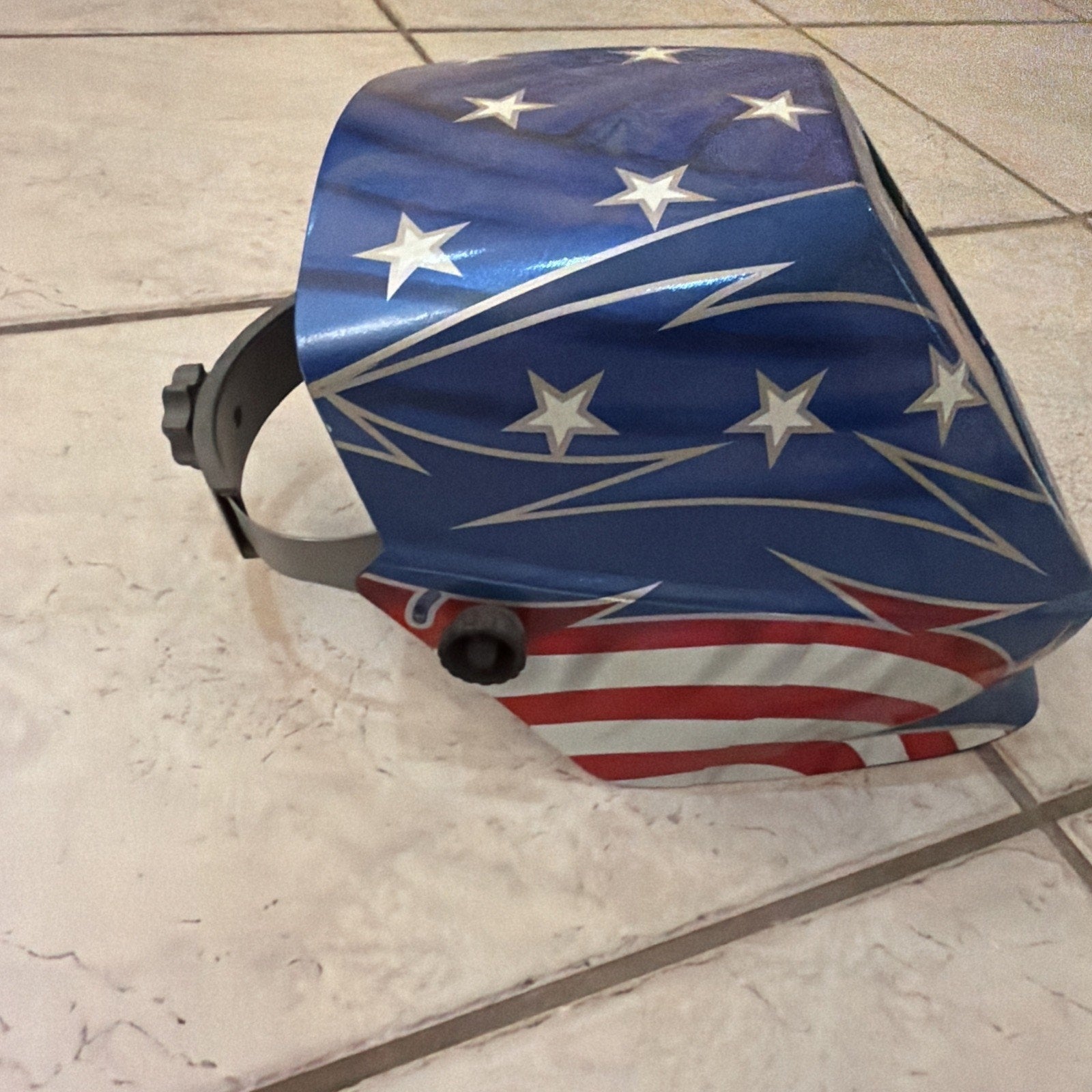 Jackson Safety HSL100 Glory Welding Helmet PRO-V auto darkening with American flag and star design on faceplate