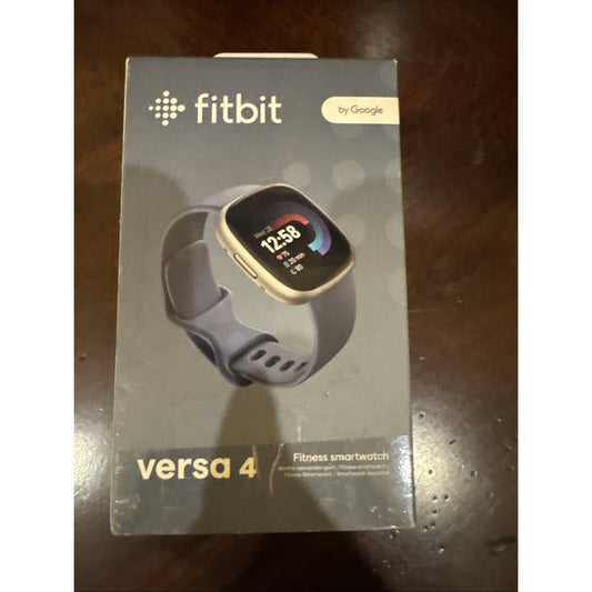 Fitbit Versa 4 fitness smartwatch in Waterfall Blue with Platinum Aluminum Case on retail packaging box front view