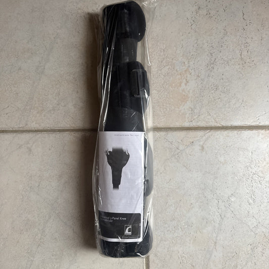 New Össur Knee Immobilizer Universal 3-Panel 22 inch model 200022 packaged in clear plastic wrap on tile floor