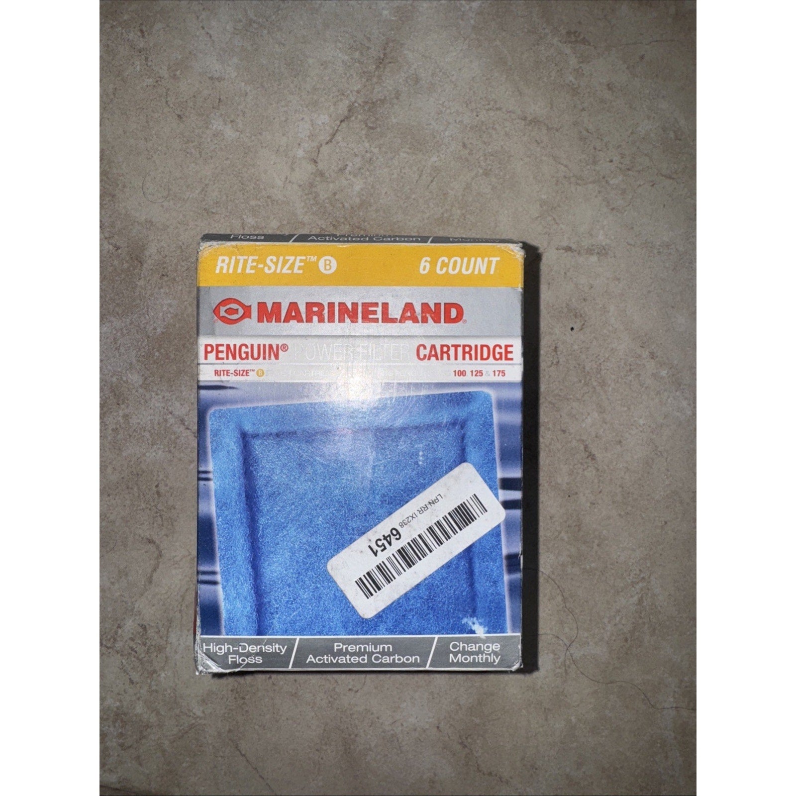 Marineland Penguin filter cartridge packaging showing a blue rectangular cartridge with features including high-density floc and premium activated carbon, designed for monthly replacement.