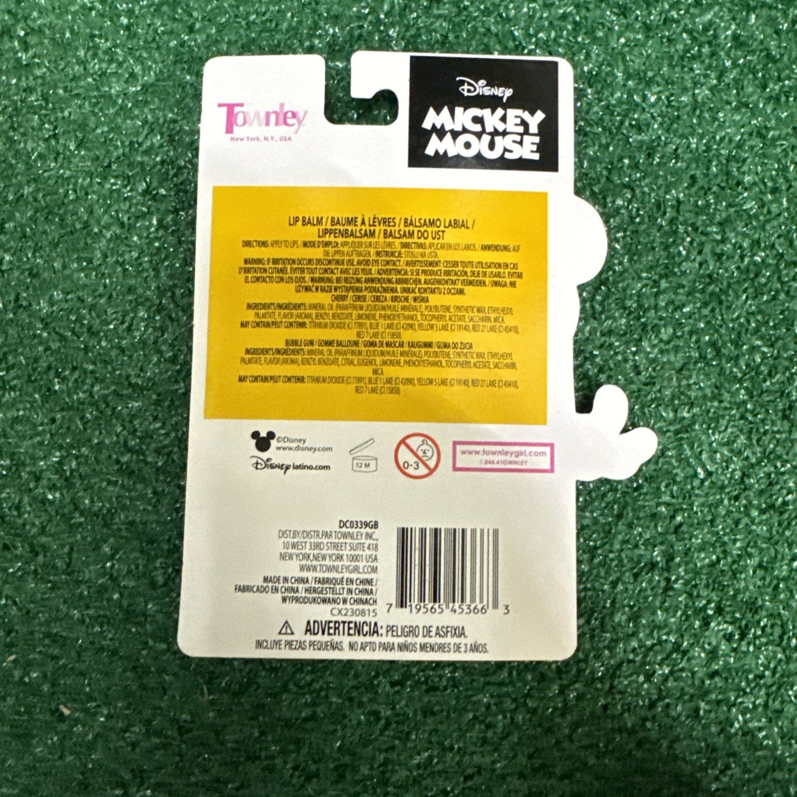 Back of Disney Mickey Mouse flavored lip balm 2 piece set packaging with ingredients and safety warnings