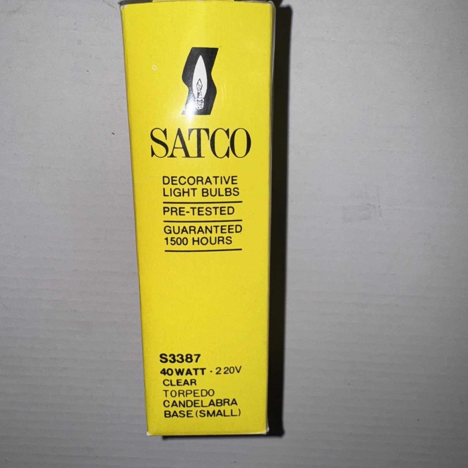 Yellow Satco S3387 box for 40 watt clear torpedo candelabra base decorative light bulb