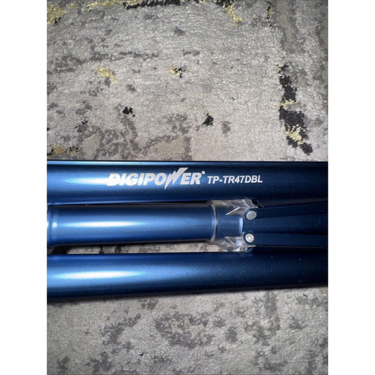 Close-up of blue Digipower TP-TR47DBL tripod legs showing hinge joint and branding on textured surface