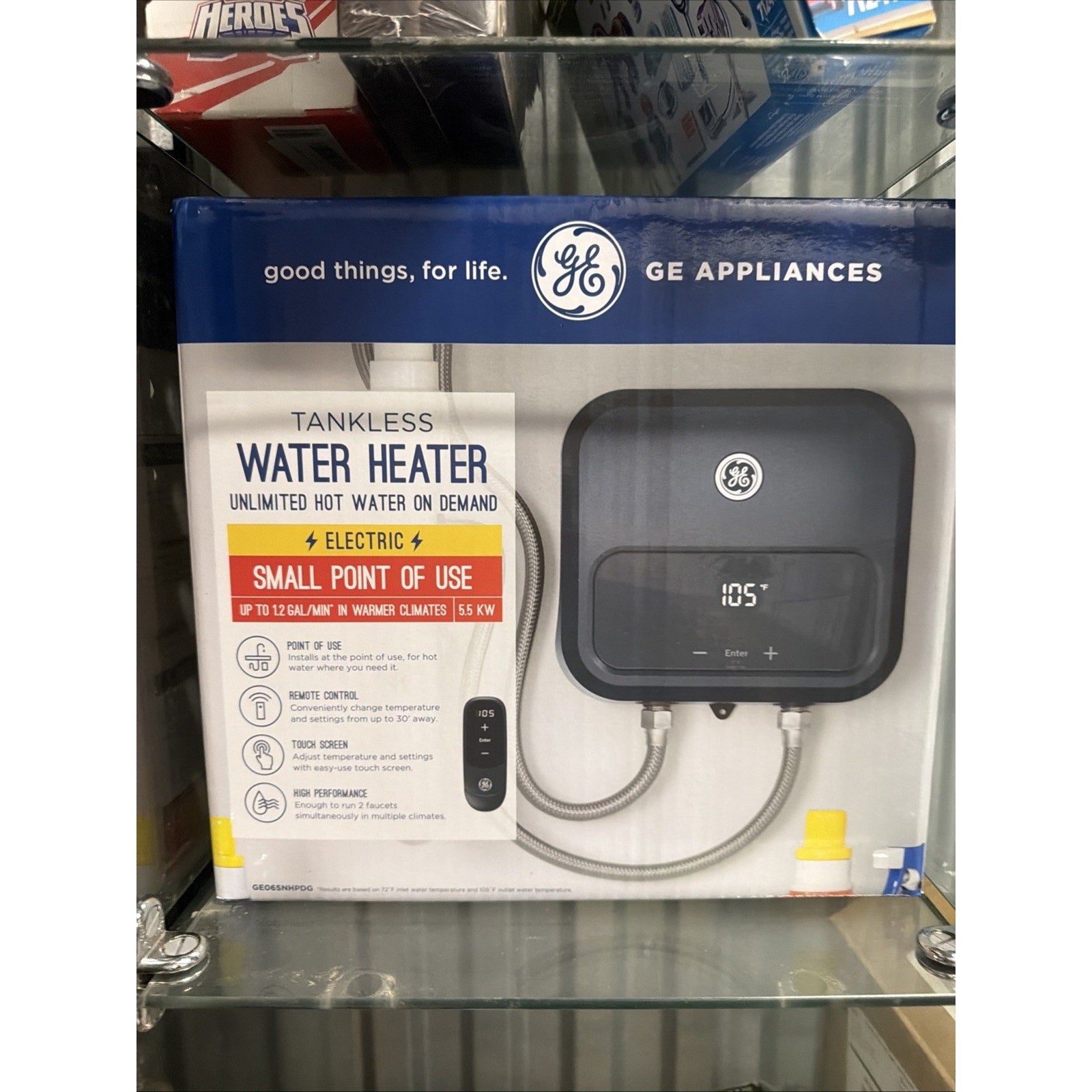 GE Appliances tankless electric water heater box displaying a compact black unit with digital temperature display set to 105°F, featuring specifications for small points of use and unlimited hot water on demand.