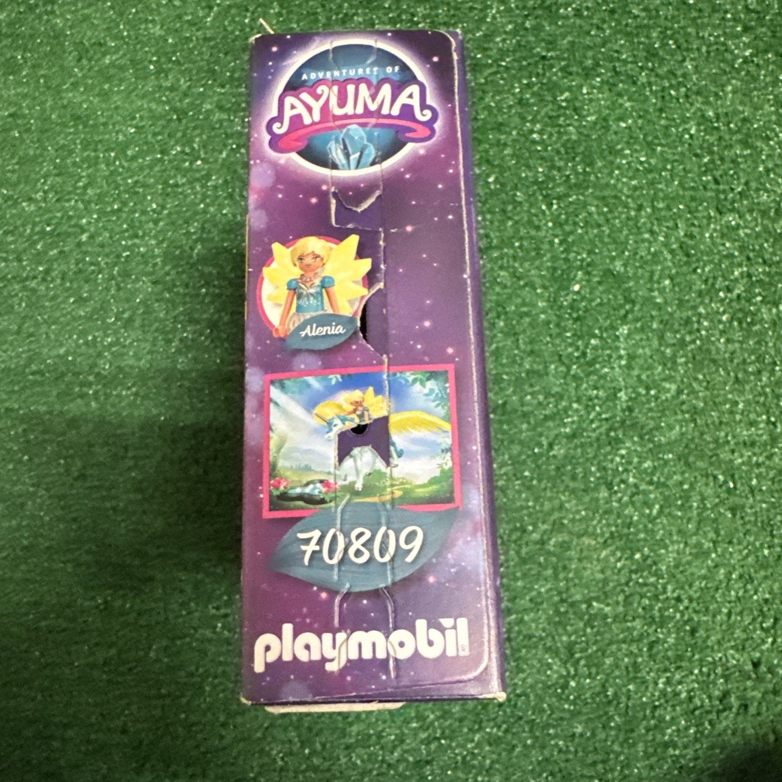 Playmobil 70809 Ayuma Crystal Fairy toy box side with logo, character Alenia, and unicorn illustration on purple background