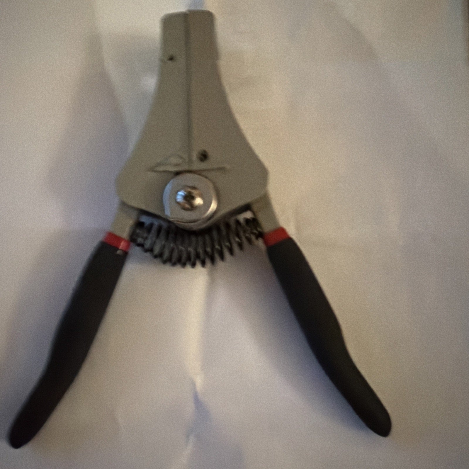 Electrical Wire Stripper Tool Type B with black and red handles and metal body for stripping electrical wires efficiently