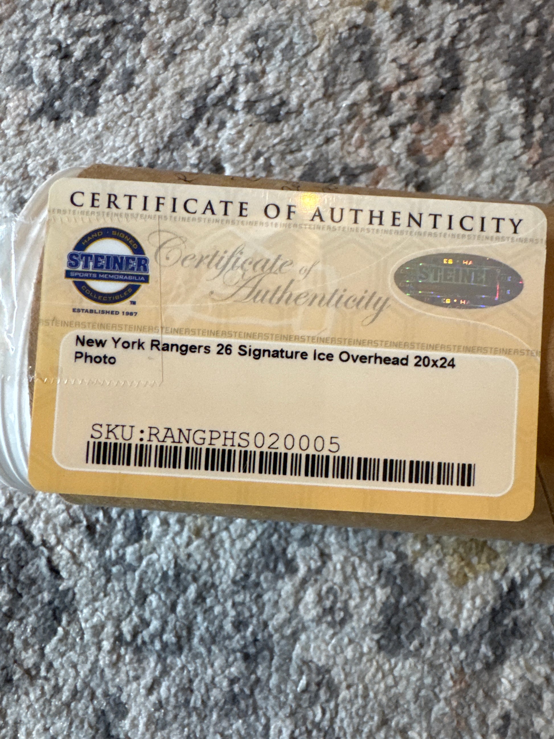 Certificate of Authenticity from Steiner verifying signed New York Rangers 20x24 team photo with 26 autographs
