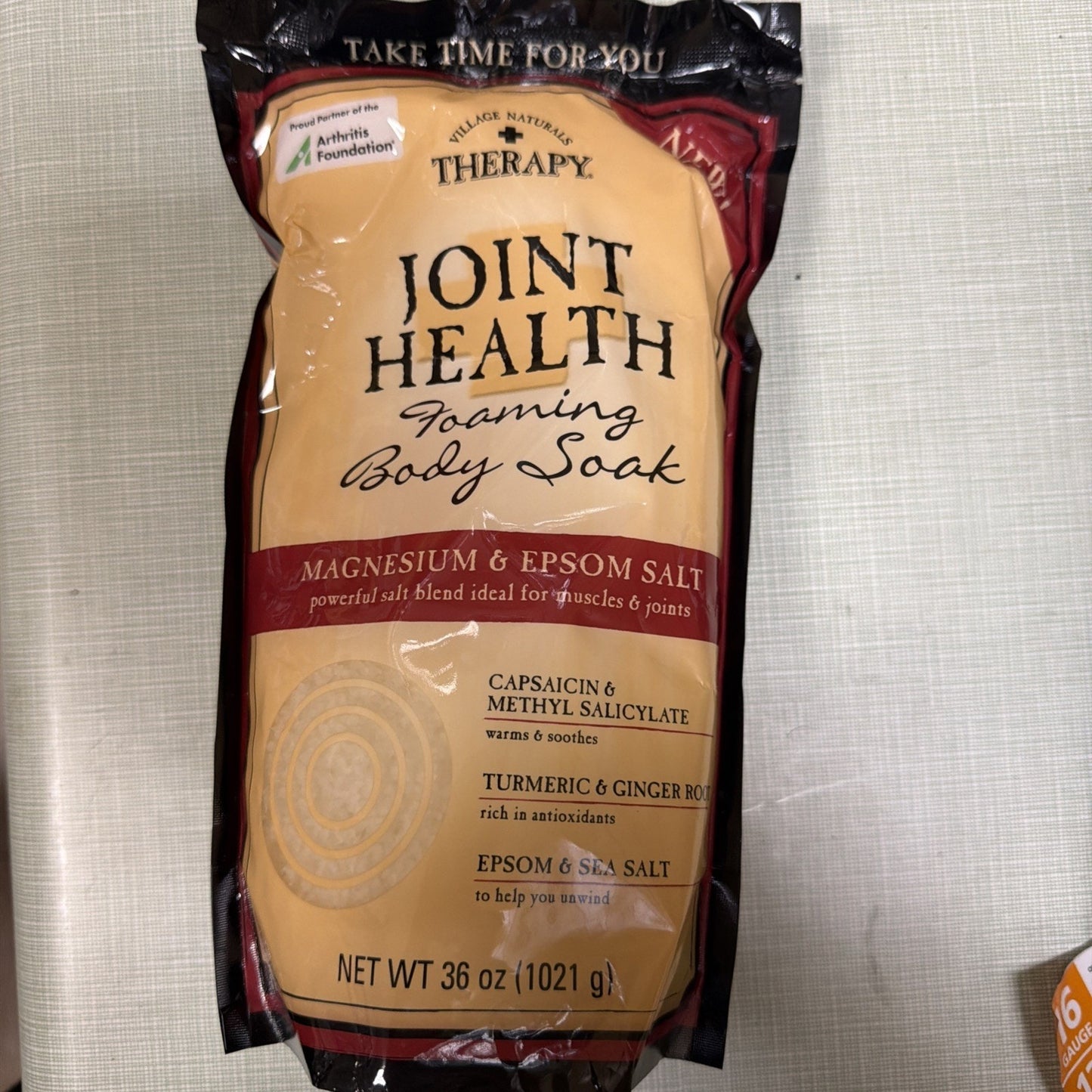 Bag of Mueller Naturals Therapy Joint Health Foaming Body Soak featuring magnesium and Epsom salt blend with capsacin, methyl salicylate, turmeric, and ginger root for muscle and joint relief.