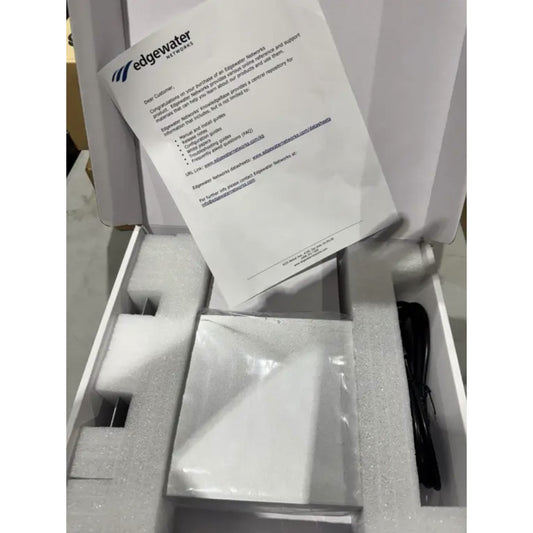 Edgewater Networks 4550 Series Gateway Ethernet switch in open white box with manual and power cable foam padding