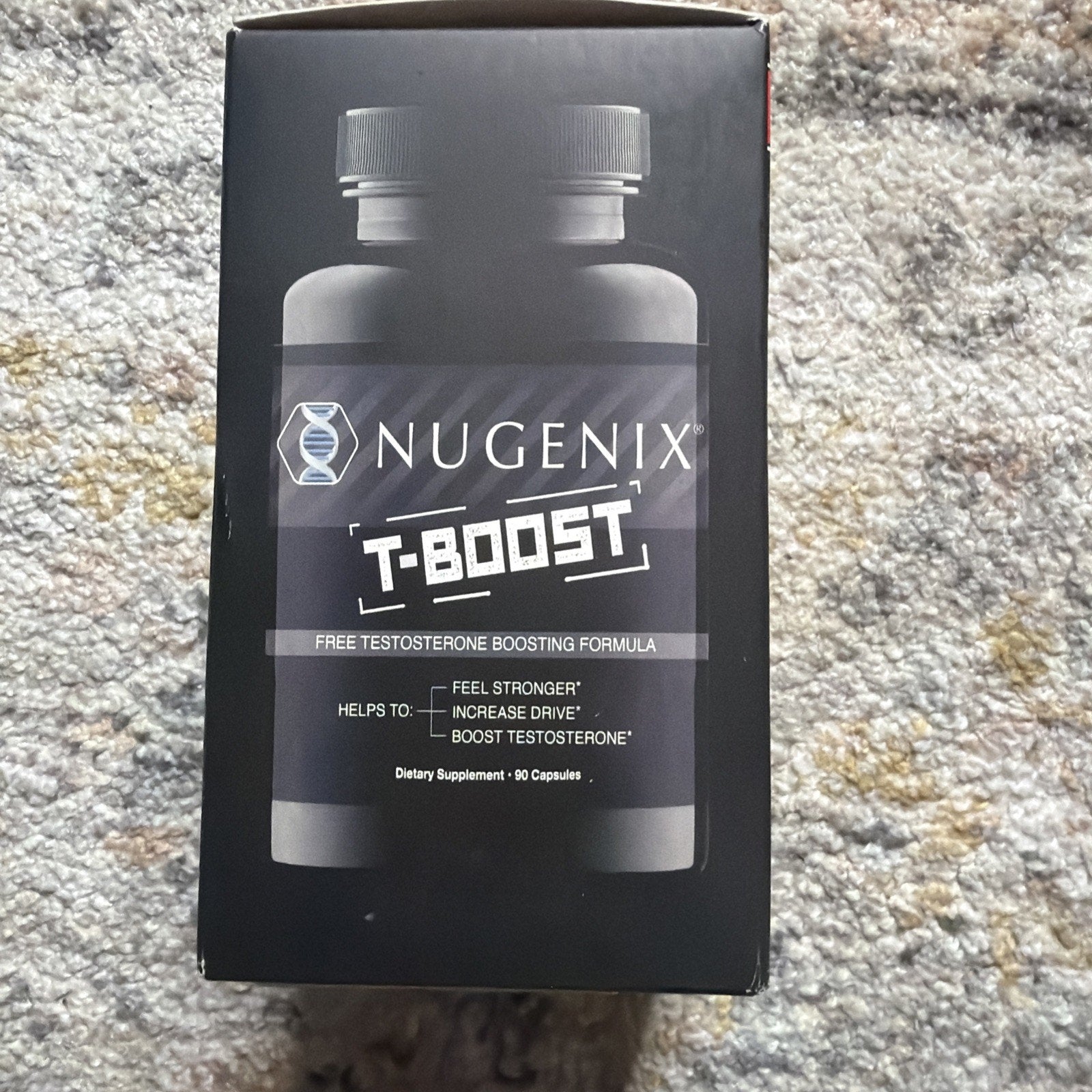 Black rectangular box featuring two dark bottles and labeled as a free testosterone boosting formula with benefits to feel stronger, increase drive, and boost testosterone, containing 90 capsules.