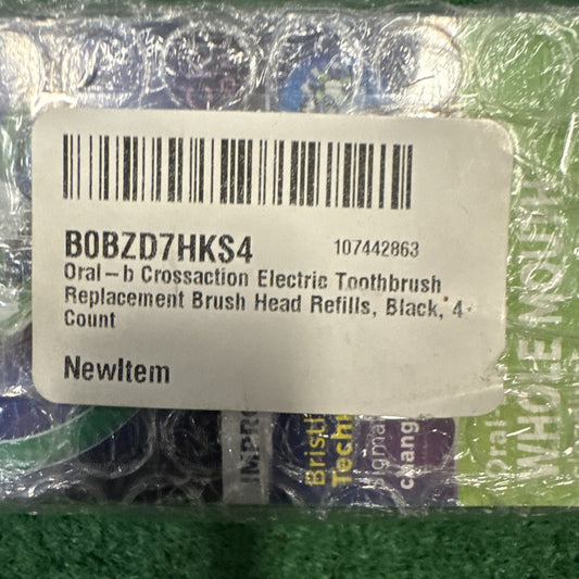 Oral-B CrossAction electric toothbrush replacement brush head refill pack with 4 black brush heads visible through plastic wrap