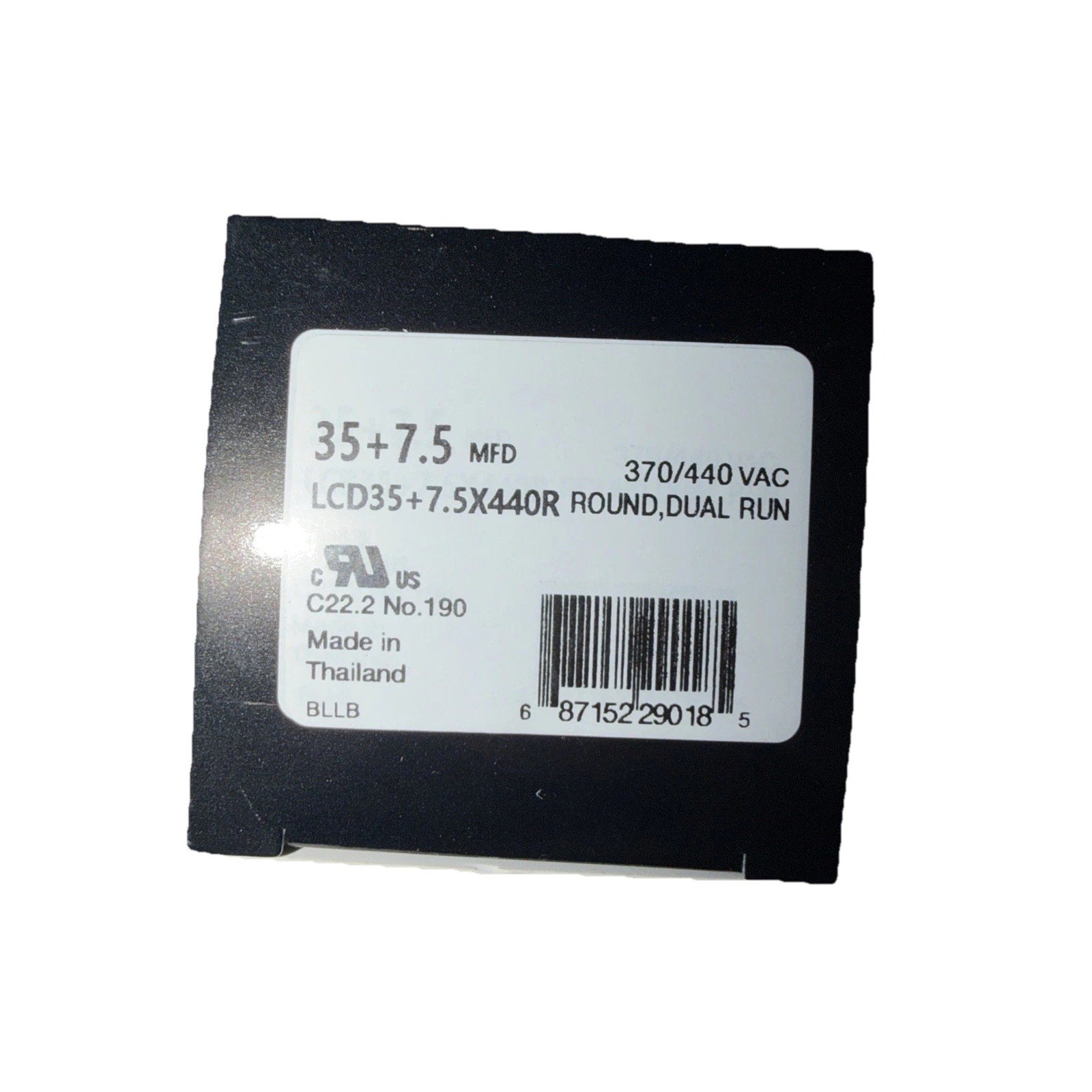 White product label on a black square component showing electrical specifications including 35+7.5 MFD, 370/440 VAC, round dual run, certified markings, barcode, and "Made in Thailand" text.