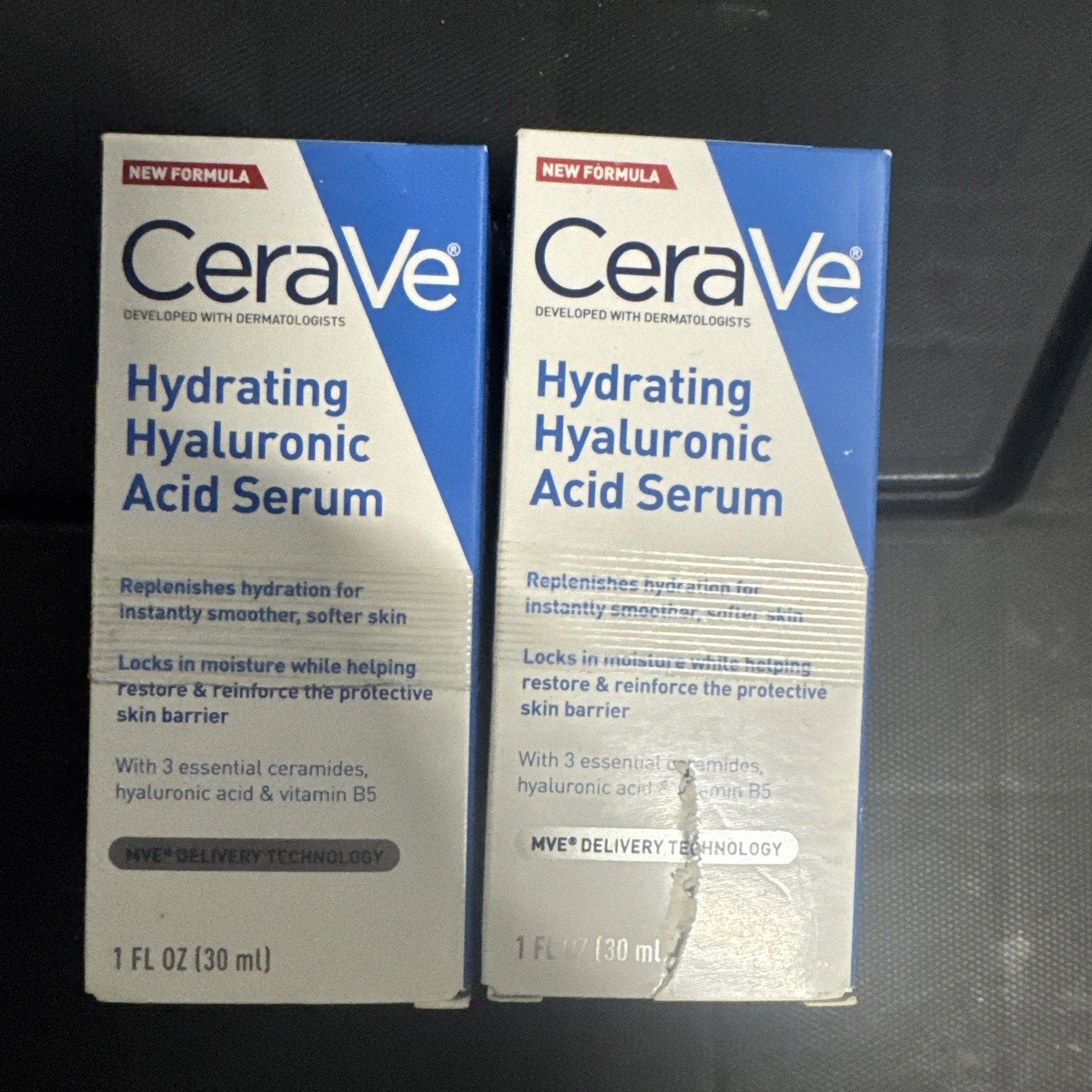 Two 1 oz boxes of CeraVe Hydrating Hyaluronic Acid Face Serum with ceramides and vitamin B5 in new formula packaging