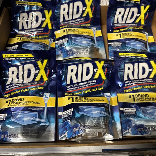 Lot of 6 Rid-X Septic System Maintenance Powder packs showing packaging with brand and product details in blue and yellow design