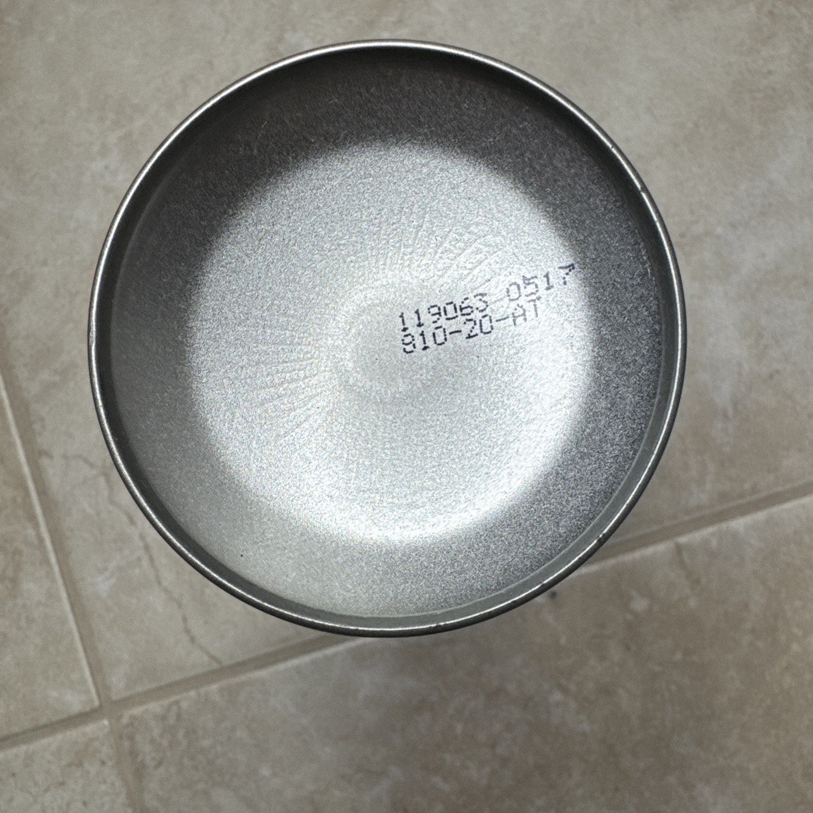 Top view of Boardwalk 352AEA 18 oz. Spray Dust Mop Treatment metal can with textured silver lid and product codes printed on top