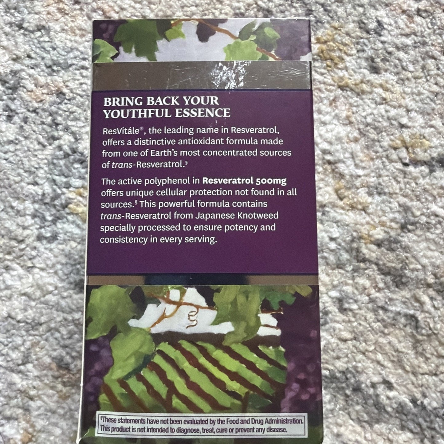 Back of a supplement box featuring text about ResVitále Resveratrol 500 mg, highlighting antioxidant benefits, cellular protection, and sourcing from Japanese Knotweed, with a nature-themed design.