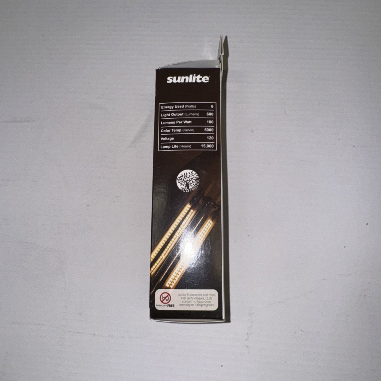 Sunlite chandelier light bulb packaging showing product details with 6 watt power and 600 lumens output