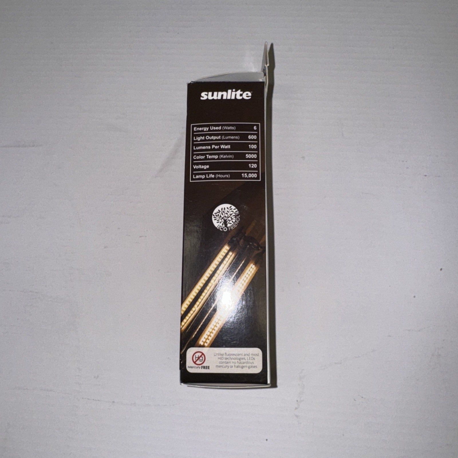 Sunlite chandelier light bulb packaging showing product details with 6 watt power and 600 lumens output